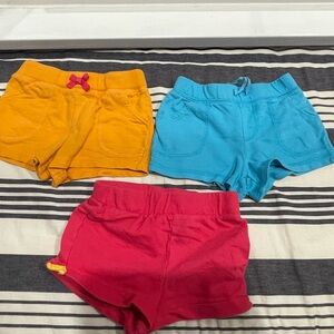 Orange, pink, and blue shorts